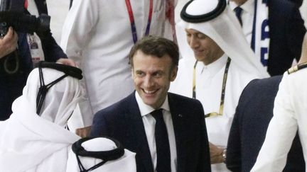 Le président français Emmanuel Macron au Qatar pour la demi-finale entre la France et le Maroc, le 14 décembre 2022 (MAXPPP)