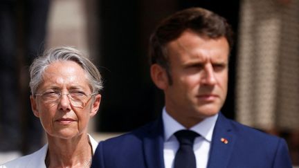 Elisabeth Borne, la Première ministre, et Emmanuel Macron, le président, le 18 juin 2022. (GONZALO FUENTES / POOL)