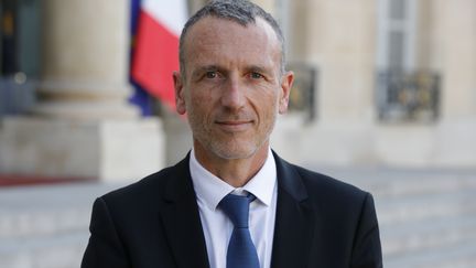 Emmanuel Faber, PDG de Danone, devant l'Élysée le 23 août 2019. (GEOFFROY VAN DER HASSELT / AFP)