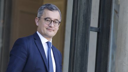 Le ministre de l'Intérieur, Gerald Darmanin, quitte le palais présidentiel de l'Élysée, le 20 décembre 2023. (LUDOVIC MARIN / AFP)