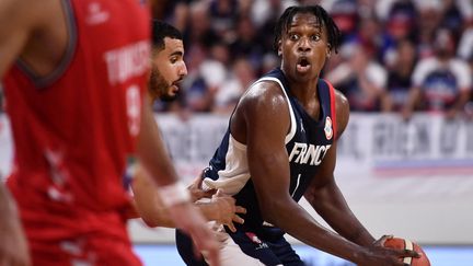 Frank Ntilikina en action avec l'équipe de France, lors du match de préparation contre la Tunisie, le 31 juillet 2023 (GAIZKA IROZ / AFP)