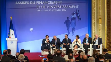 &nbsp; (François Hollande, ses ministres et des entrepreneurs lors des Assises de l'investissement le 15 septembre 2014 © MaxPPP)