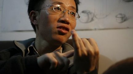 Hu Jia le 9 janvier 2007 lors d'une interview à son domicile de Pékin (AFP / Frederic J. Brown)