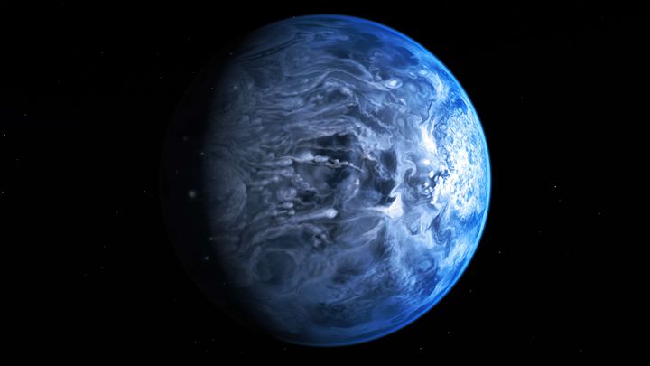 Vue d'artiste de la plan&egrave;te HD 189733b, une gigantesque exoplan&egrave;te gazeuse bleue o&ugrave; r&egrave;gne une temp&eacute;rature sup&eacute;rieure &agrave; 1 000&deg;C et o&ugrave; soufflent des vents de 30 000 km/h. (NASA / SIPA USA)