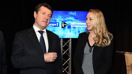 Les candidats en région  Provence-Alpes-Cote d'Azur, à gauche&nbsp;Christian Estrosi (Les Républicains) et à droite Marion Maréchal-Le Pen (Front national), le 8 décembre 2015 à Marseille (Bouches-du-Rhône). (ANNE-CHRISTINE POUJOULAT / AFP)