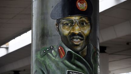 Le portrait de Muhammadu Buhari, général et homme d'Etat, actuel président de du Nigeria depuis le 29 mai 2015, réélu le 23 février 2019, &nbsp;n'est pas oublié. (PIUS UTOMI EKPEI / AFP)