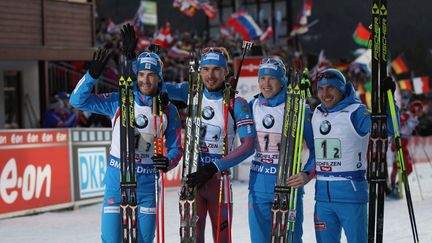 Les quatre biathlètes russes du relais victorieux (de gauche à droite) : Dmitry Malyshko, Anton Shipulin, Alexei Volkov, et Yevgeny Garanichev. (RIA Novosti) (RIA NOVOSTI)