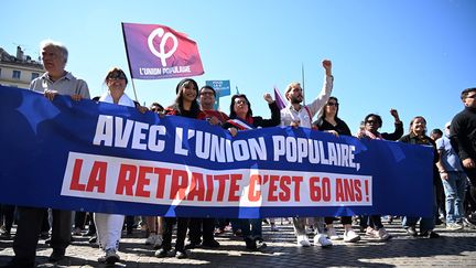 Des manifestants du 1er mai 2022 à Marseille. (CHRISTOPHE SIMON / AFP)