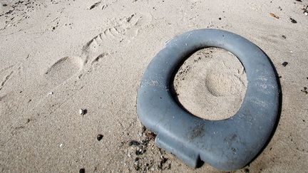 celui de la contamination par des agents pathogènes présents dans l'eau, comme les coliformes (bactéries) fécaux. Leur présence a été détectée au bord de la plage de Copacabana. (Reuters/Sergio Moraes)