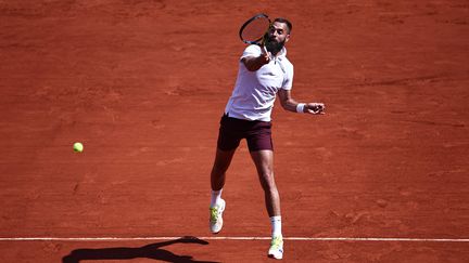 Le Français Benoît Paire lors de son premier tour de Roland-Garros contre le Britannique Cameron Norrie, le 29 mai 2023. (ANNE-CHRISTINE POUJOULAT / AFP)