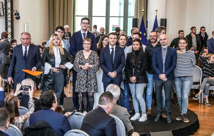 Emmanuel Macron with the 12 French people selected by the regional press to ask him questions, March 18, 2022.   (MAXPPP)