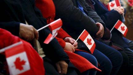 L'accueil de réfugiés syriens dans une église de Toronto (Canada), le 11 décembre 2015.&nbsp; (MARK BLINCH / REUTERS)