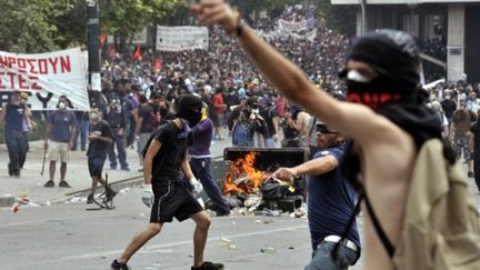 Les manifestants ont affronté les forces de l'ordre, protestant contre le plan d'austérité. (AFP / ARIS MESSINIS)