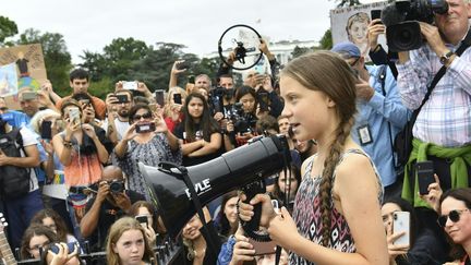 &nbsp;Greta Thunberg prend la parole lors d'une manifestation pour le climat devant la Maison Blanche à Washington, le 13 septembre 2019.&nbsp; (NICHOLAS KAMM / AFP)