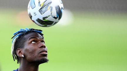 Paul Pogba à l'entraînement à Turin, le 8 octobre 2021. (FRANCK FIFE / AFP)