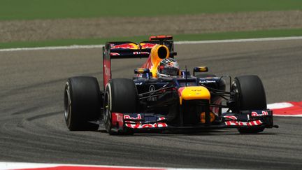 La Formule 1 de l'Allemand Sebastian Vettel sur le circuit de Bahre&iuml;n, samedi 21 avril. (DIMITAR DILKOFF / AFP)