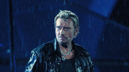 Johnny Hallyday lors du concert au Stade de France, en septembre 1998. (BERTRAND GUAY / AFP)