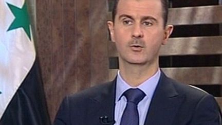 Bachar al Assad, le président syrien, lors d'une intervention télévisée le 21 août 2011. (Syrian TV - AFP)