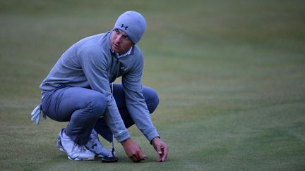 Jordan Spieth doit boucler son deuxième tour (GLYN KIRK / AFP)