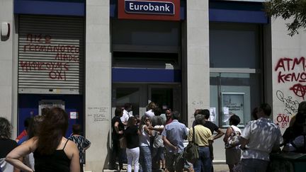 &nbsp; (Queue devant un distributeur le 8 juillet 2015 à Athènes © Reuters/Alkis Konstantinidis)