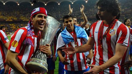 Les joueurs de l'Atletico Madrid c&eacute;l&egrave;brent leur victoire en finale de l'Europa League le 9 mai. (PIERRE-PHILIPPE MARCOU / AFP)