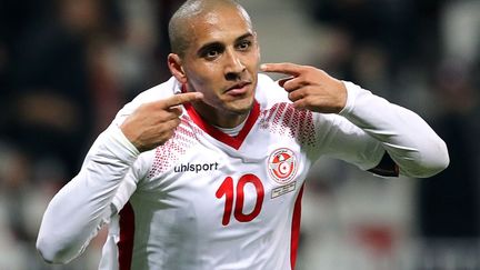 Meilleur butteur de l’équipe de Rennes, né à Ajaccio en 1991, Wahbi Khazri a la lourde charge de symboliser le renouveau des Aigles de Carthage, qualifiés pour la première fois depuis 2006 pour le Mondial. Il a fait quasiment toute sa carrière en France, à l’exception d’un passage par l’Angleterre. Il a eu sa première sélection dans l’équipe de Tunisie en 2013. (VALERY HACHE / AFP)