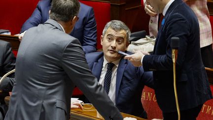 Le ministre de l'Intérieur, Gérald Darmanin, lors de l'examen en séance publique du projet de loi sur l'immigration, à l'Assemblée nationale, le 11 décembre 2023. (LUDOVIC MARIN / AFP)