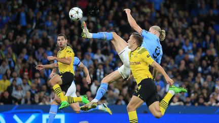 Le but sensationnel d'Erling Haaland avec Manchester City face au Borussia Dortmund, lors de la deuxième journée de Ligue des champions, le 14 septembre 2022. (LINDSEY PARNABY / AFP)