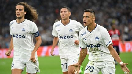 Matteo Guendouzi, Amine Harit et Alexis Sanchez lors de Marseille-Lille, le 10 septembre 2022. (CHRISTOPHE SIMON / AFP)