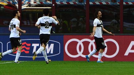 La joie et la rage des joueurs de Parme (GIUSEPPE CACACE / AFP)