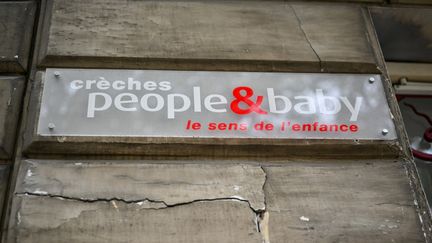 A logo of the People&Baby group in Versailles (Yvelines), September 24, 2024. (HENRIQUE CAMPOS / HANS LUCAS / AFP)