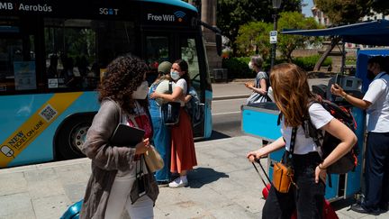 Les touristes doivent s'habituer à de nouvelles restrictions sanitaires liées au Covid-19.  (DAVIDE BONALDO / CONTROLUCE VIA AFP)