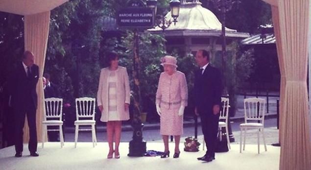 &nbsp; (Le marche aux fleurs de l'île de la Cité a été rebaptisé du nom de la reine Elisabeth II lors d'une cérémonie samedi en présence de la reine d'Angleterre, du président français et de la maire de Paris © Radio France / Franck Mathevon)