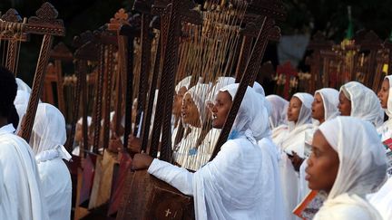 enveloppées d’un chamma, le châle blanc traditionnelle.  (Minasse Wondimu Hailu / ANADOLU AGENCY / AFP)