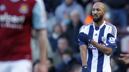 L'attaquant Nicolas Anelka fait une "quenelle" au cours d'un match de premi&egrave;re division anglaise, le 28 d&eacute;cembre 2013. (IAN KINGTON / AFP)