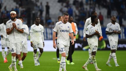 Les joueurs de l'Olympique de Marseille après le match de Ligue 1 contre Ajaccio au stade Vélodrome, le 8 octobre 2022. (SYLVAIN THOMAS / AFP)