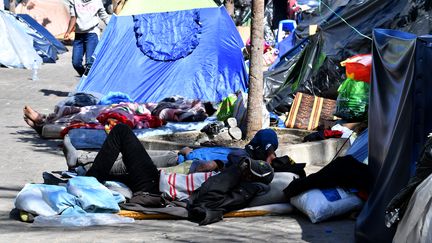 Migrants in Tunis, April 12, 2023. (FETHI BELAID / AFP)