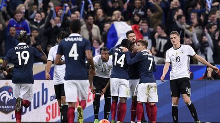 Olivier Giroud buteur avec la France contre l'Allemagne (FRANCK FIFE / AFP)