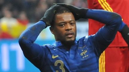 Le d&eacute;fenseur de l'&eacute;quipe de France Patrice Evra lors du match face &agrave; l'Espagne, le 26 mars 2013, au Stade de France.&nbsp; (REAU ALEXIS/SIPA)