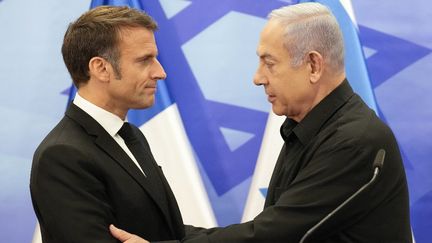 French President Emmanuel Macron and Israeli Prime Minister Benjamin Netanyahu on October 24, 2023 in Jerusalem.  (CHRISTOPHE ENA / AFP)