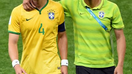 Les défenseurs brésiliens David Luiz et Thiago Silva lors du Mondial 2014 (ANDREAS GEBERT / DPA)