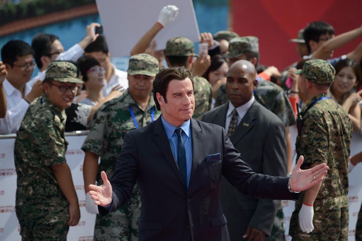 John Travolta &eacute;tait pr&eacute;sent dans la ville portuaire de Qingdao (Chine). (ED JONES / AFP)