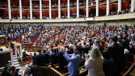 Les députés après le rejet du projet de loi sur l'immigration à l'Assemblée nationale, à Paris, le 11 décembre 2023. (LUDOVIC MARIN / AFP)