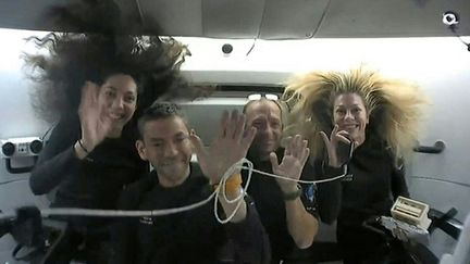 Jared Isaacman, Anna Menon, Sarah Gillis and Scott Poteet, members of SpaceX's Polaris Dawn mission, pose from space, September 13, 2024. (POLARIS PROGRAM / AFP)