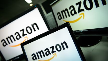 Des logos Amazon sur des écrans. (LEON NEAL / AFP)