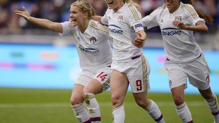 Ada Hegerberg, Eugenie Le Sommer et Amel Majri (ROMAIN LAFABREGUE / AFP)