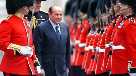 Le Premier ministre italien, Silvio Berlusconi, à Londres, le 13 juillet 2004. (MARTIN HAYHOW / AFP)