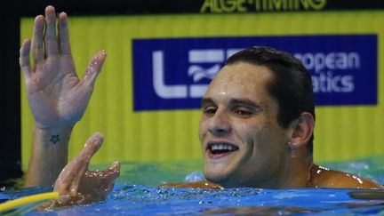  (Florent Manaudou remporte la finale du 50m nage libre et obtient un quatrième titre à Berlin. © REUTERS / Michael Dalder)