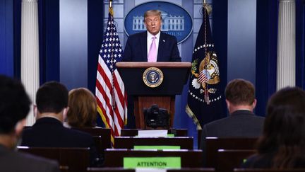 L'ancien président américain Donald Trump lors d'une conférence de presse à la Maison Blanche à Washington, le 11 août 2020. (BRENDAN SMIALOWSKI / AFP)