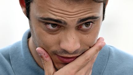 L'acteur Sofiane Bennacer lors du photocall du Festival de Cannes le 23 mai 2022 (LOIC VENANCE / AFP)